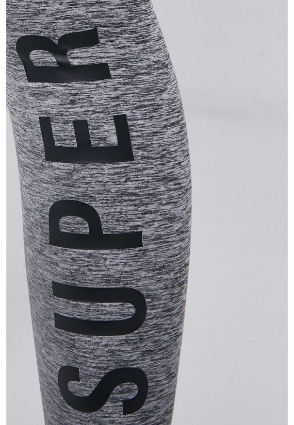 Superdry Legginsy damskie kolor szary melanżowe. Kolor: szary. Materiał: dzianina. Wzór: melanż