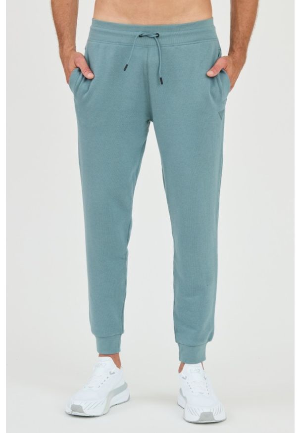 Guess - GUESS Patynowe męskie spodnie dresowe, Rozmiar XL. Kolor: zielony. Materiał: dresówka