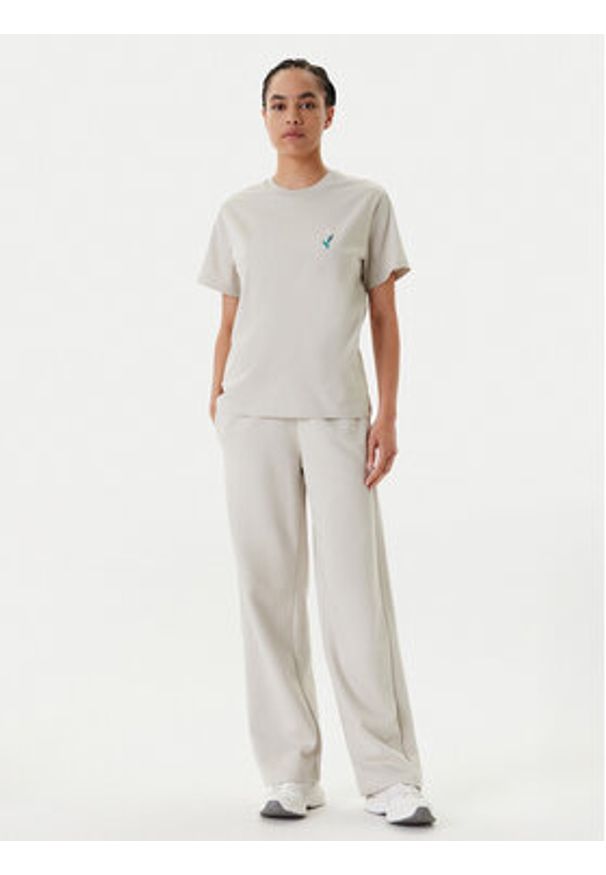 Adidas - adidas Spodnie dresowe Essentials Small Logo Feel Cozy JC5922 Beżowy Regular Fit. Kolor: beżowy. Materiał: syntetyk, bawełna