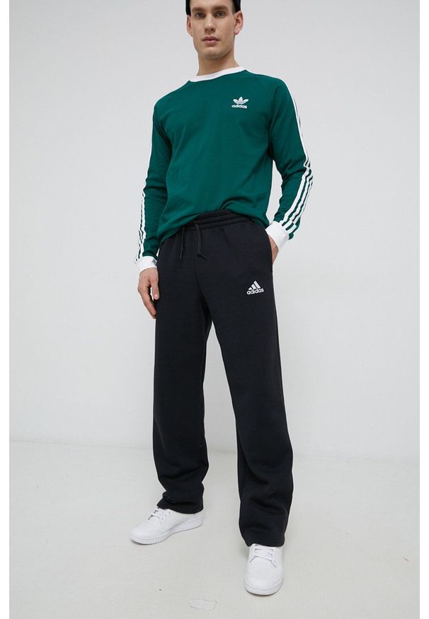 Adidas - adidas Spodnie GK9366 męskie kolor czarny gładkie. Kolor: czarny. Materiał: poliester, dzianina. Wzór: gładki