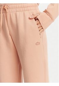 Lacoste Spodnie dresowe XF0343 Pomarańczowy Regular Fit. Kolor: pomarańczowy. Materiał: bawełna #4