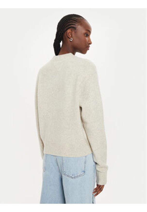 Tommy Jeans Sweter Flag DW0DW18681 Beżowy Relaxed Fit. Kolor: beżowy. Materiał: syntetyk
