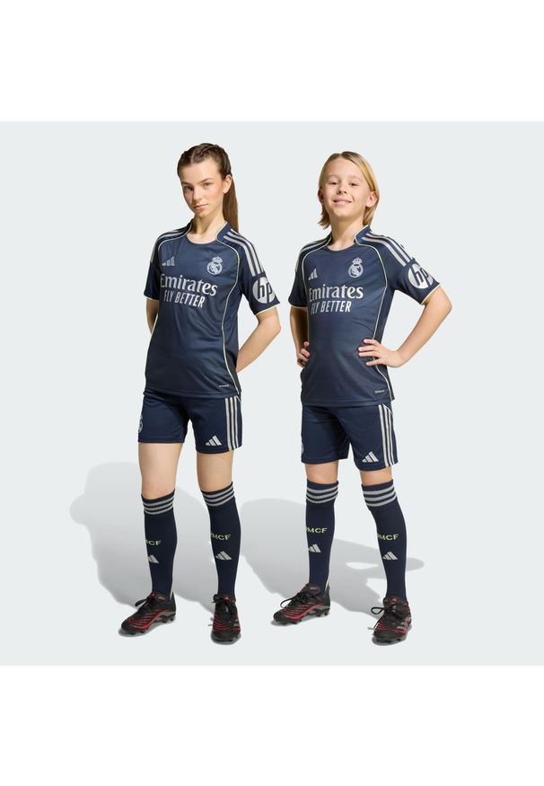 Adidas - Szorty Real Madrid 25/26 Away Kids. Kolor: niebieski. Sport: piłka nożna