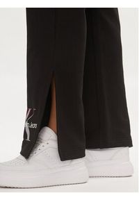 Calvin Klein Jeans Spodnie dresowe Diffused Monologo J20J223422 Czarny Regular Fit. Kolor: czarny. Materiał: bawełna