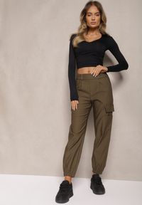 Renee - Ciemnozielone Zwężane Spodnie z Gumką w Pasie i Wsuwanymi Kieszeniami Lerana. Okazja: na spotkanie biznesowe, na co dzień. Kolor: zielony. Styl: casual, elegancki, biznesowy