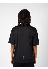 Fila T-Shirt "Ronchin" | FAM0281 | Mężczyzna | Czarny. Okazja: na co dzień. Kolor: czarny. Materiał: poliester. Styl: casual