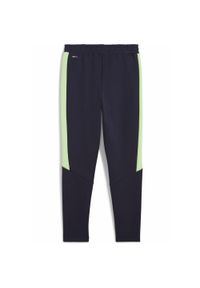 Puma - Młodzieżowe spodnie Evostripe PUMA New Navy Blue. Kolor: niebieski