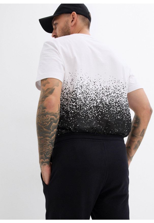 bonprix - Spodnie sportowe, regular fit. Okazja: na co dzień. Kolor: czarny. Materiał: dzianina, dresówka. Styl: sportowy