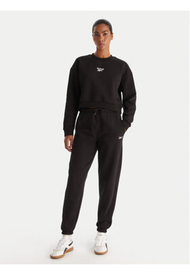 Reebok Spodnie dresowe Reebok X Ewa Chodakowska Evren RK25308CCW Czarny Regular Fit. Kolor: czarny. Materiał: bawełna, syntetyk