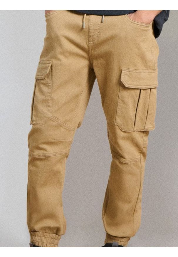 Sinsay - Jeansy regular jogger cargo - żółty. Kolor: żółty