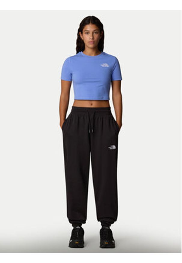 The North Face Spodnie dresowe Essential NF0A8C1G Czarny Relaxed Fit. Kolor: czarny. Materiał: syntetyk, bawełna