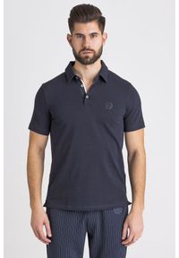 POLO Armani Exchange. Typ kołnierza: polo. Wzór: jednolity, nadruk. Styl: sportowy