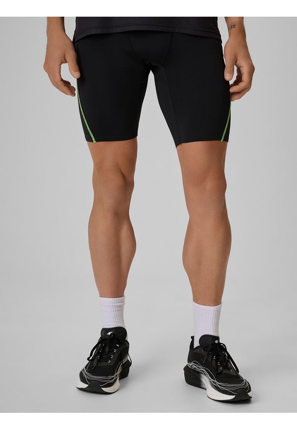 4f - 4F Legginsy kolarki do biegania szybkoschnące męskie - czarne XL. Kolor: czarny. Materiał: materiał, włókno. Sport: fitness, bieganie