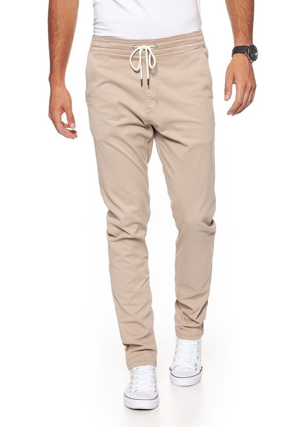 Wrangler - WRANGLER SPODNIE MĘSKIE DRAWSTRING CHINO CAMEL WASHED W16DP749J $. Materiał: materiał