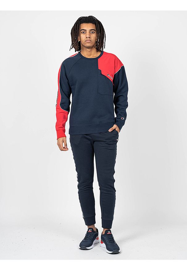 Champion Spodnie "Sweat Pants" | 216561 | Mężczyzna | Granatowy. Okazja: na co dzień. Kolor: niebieski. Materiał: bawełna, poliester. Wzór: nadruk. Styl: casual