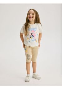 Reserved - Legginsy 3/4 Bluey - beżowy. Kolor: beżowy. Materiał: bawełna. Długość: krótkie