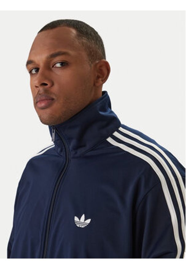 Adidas - adidas Bluza Firebird KD8313 Granatowy Loose Fit. Kolor: niebieski. Materiał: syntetyk