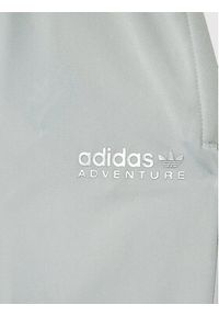 Adidas - adidas Spodnie dresowe Adventure HE2066 Szary Regular Fit. Kolor: szary. Materiał: syntetyk #2
