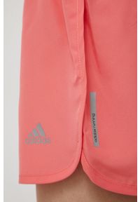 adidas Performance szorty do biegania damskie kolor różowy gładkie medium waist. Kolor: różowy. Materiał: dzianina, tkanina, materiał. Wzór: gładki