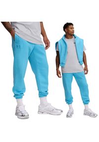 Spodnie dresowe męskie Under Armour joggery. Kolor: niebieski. Materiał: dresówka. Długość: długie #1