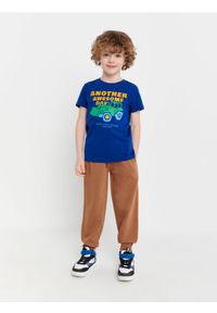 Sinsay - Spodnie dresowe jogger - beżowy. Kolor: beżowy. Materiał: dresówka #1