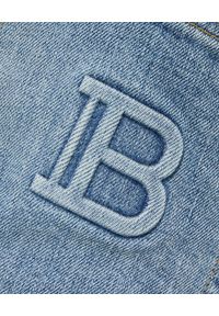 Balmain - BALMAIN - Niebieskie jeansy z haftowanym logo. Kolor: niebieski. Długość: długie. Wzór: haft. Styl: klasyczny #5