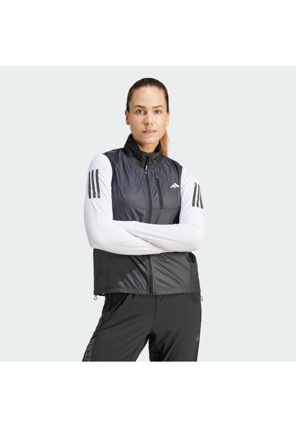 Adidas - Bezrękawnik Own the Run. Kolor: czarny. Materiał: materiał. Długość rękawa: bez rękawów. Sport: bieganie