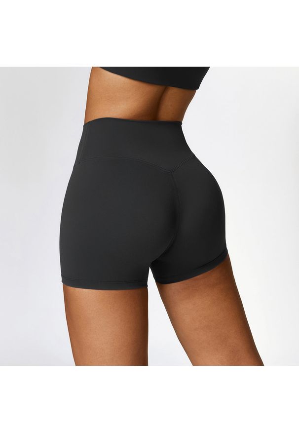 Intica - Krótkie legginsy sportowe z wysokim stanem i oddychającym materiałem Betsi. Stan: podwyższony. Kolor: beżowy. Materiał: materiał. Długość: krótkie. Sport: fitness