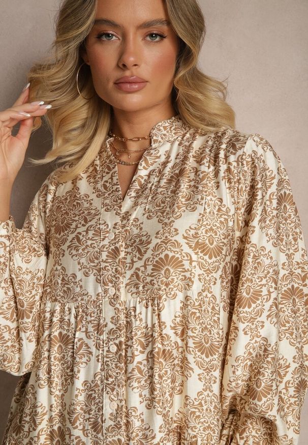 Renee - Beżowa Wiskozowa Sukienka w Ornamentalny Wzór o Rozkloszowanym Kroju Gonalia. Okazja: na co dzień. Typ kołnierza: dekolt w kształcie V. Kolor: beżowy. Materiał: wiskoza. Długość rękawa: długi rękaw. Typ sukienki: rozkloszowane, oversize. Styl: casual, elegancki