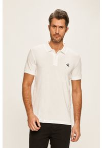 Calvin Klein Jeans - Polo. Okazja: na co dzień. Typ kołnierza: polo. Kolor: biały. Materiał: dzianina. Długość: krótkie. Styl: casual #1