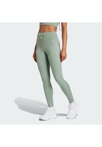 Adidas - Legginsy Running Essentials. Kolor: zielony. Materiał: materiał. Sport: bieganie