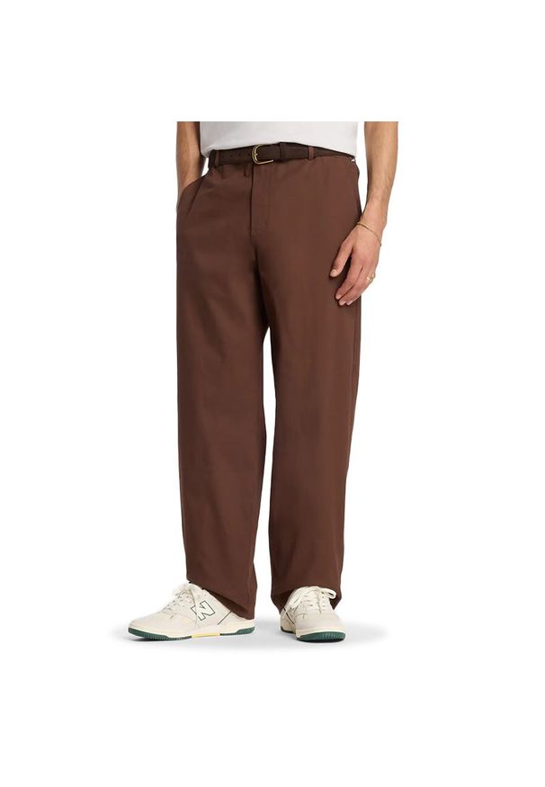 Spodnie męskie New Balance MP51953ABJ - brązowe. Kolor: brązowy. Materiał: materiał, bawełna, dresówka