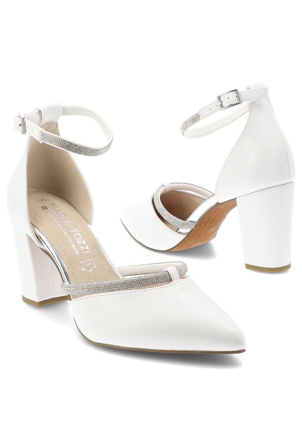 Czółenka damskie Marco Tozzi, ze skóry naturalnej na stabilnym słupku zapewniającym wygodę z paskiem wokół kostki poprawiającym dopasowanie i stabiln. Okazja: na wesele, na imprezę, na ślub cywilny. Zapięcie: pasek. Kolor: biały. Szerokość cholewki: normalna. Materiał: skóra. Sezon: lato. Obcas: na słupku. Styl: elegancki. Wysokość obcasa: średni