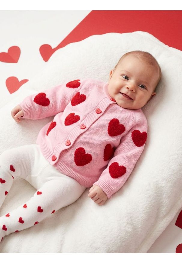 Sinsay - Bawełniany sweter ze wzorem w serca - różowy. Kolor: różowy. Materiał: bawełna