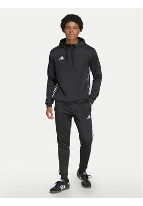Adidas - adidas Spodnie dresowe Tiro 25 Essentials Sweat JC5464 Czarny Regular Fit. Kolor: czarny. Materiał: syntetyk