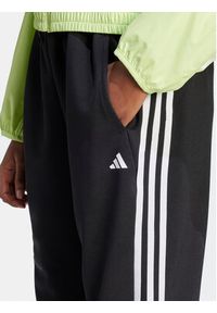 Adidas - adidas Spodnie dresowe Train Essentials HZ5646 Czarny Loose Fit. Kolor: czarny. Materiał: syntetyk