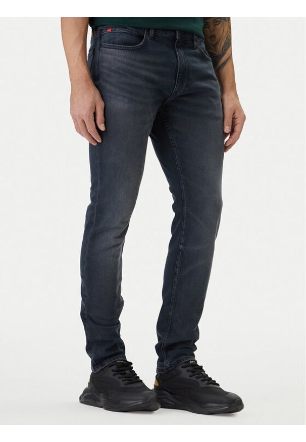 Hugo - HUGO Jeansy 50556055 Granatowy Extra Slim Fit. Kolor: niebieski