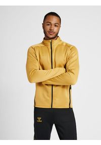 Bluza dresowa zapinana na zamek błyskawiczny Hummel Cima XK. Kolor: żółty, wielokolorowy, beżowy. Materiał: dresówka. Wzór: nadruk
