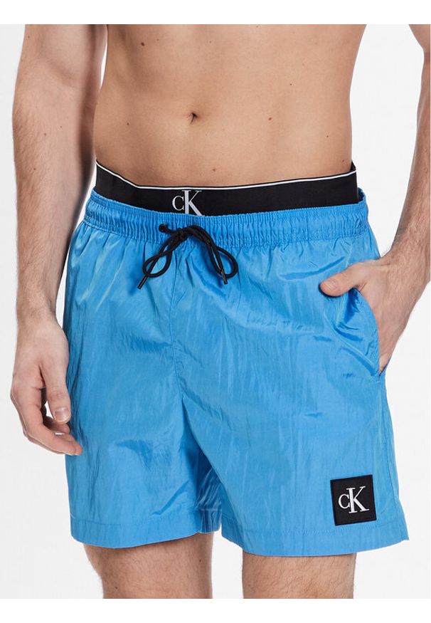 Calvin Klein Swimwear Szorty kąpielowe Medium Double Wb KM0KM00846 Niebieski Regular Fit. Kolor: niebieski. Materiał: syntetyk