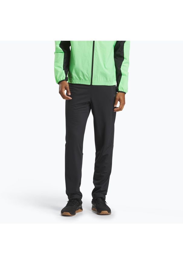 Reebok Fitness - Spodnie męskie Reebok Id Train Knit. Kolor: czarny. Sport: fitness