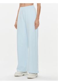 Calvin Klein Jeans Spodnie dresowe J20J222597 Niebieski Relaxed Fit. Kolor: niebieski. Materiał: bawełna, dresówka