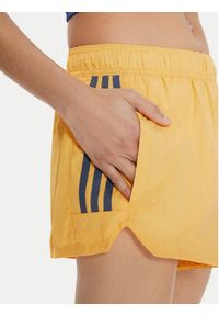 Adidas - adidas Szorty sportowe Tiro Cut 3-Stripes IS0722 Żółty Loose Fit. Kolor: żółty. Materiał: syntetyk