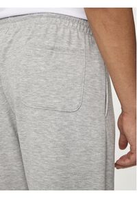 New Balance Spodnie dresowe Essentials MP41519 Szary Relaxed Fit. Kolor: szary. Materiał: bawełna