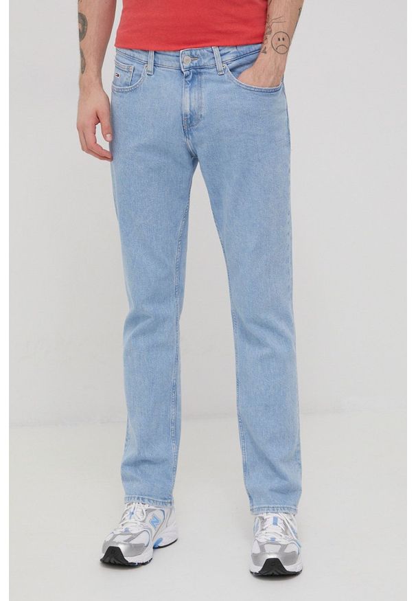 Tommy Jeans jeansy RYAN BF6132 męskie. Kolor: niebieski