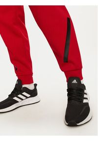 Adidas - adidas Spodnie dresowe Z.N.E. JF6542 Czerwony Regular Fit. Kolor: czerwony. Materiał: bawełna