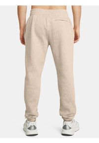 Spodnie treningowe męskie Under Armour Essential Fleece Joggers. Kolor: brązowy. Sport: fitness