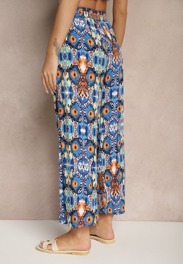 Renee - Niebieskie Bawełniane Spodnie High Waist Szerokie we Wzór Boho Tolioria. Okazja: na co dzień, do pracy. Stan: podwyższony. Kolor: niebieski. Materiał: bawełna. Styl: boho