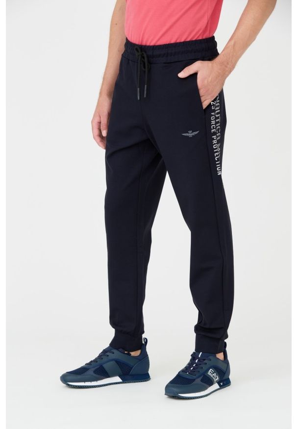 Aeronautica Militare - AERONAUTICA MILITARE Granatowe męskie spodnie dresowe, Rozmiar XL. Kolor: niebieski. Materiał: dresówka