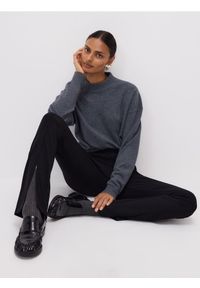 Reserved - Legginsy z rozcięciami - czarny. Kolor: czarny. Materiał: dzianina #1