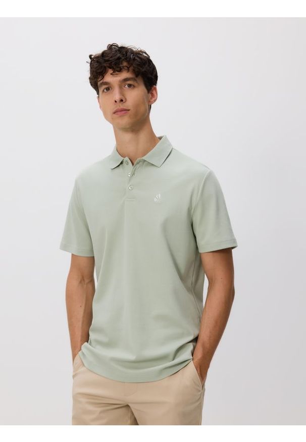 Reserved - Koszulka polo regular fit - jasnozielony. Typ kołnierza: polo. Kolor: zielony. Materiał: dzianina, bawełna